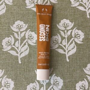 The Body Shop Second Skin Multi-Tasking Skin Tint- TAN  1W